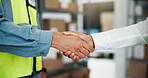 Business people, logistics and supply chain with handshake for partnership, b2b or agreement. Closeup, distributor or supplier shaking hands with deal for cargo distribution or teamwork in warehouse