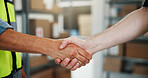 Business people, logistics and handshake with partnership for b2b, supply chain or agreement. Closeup, distributor or supplier shaking hands with deal for cargo distribution or teamwork in warehouse
