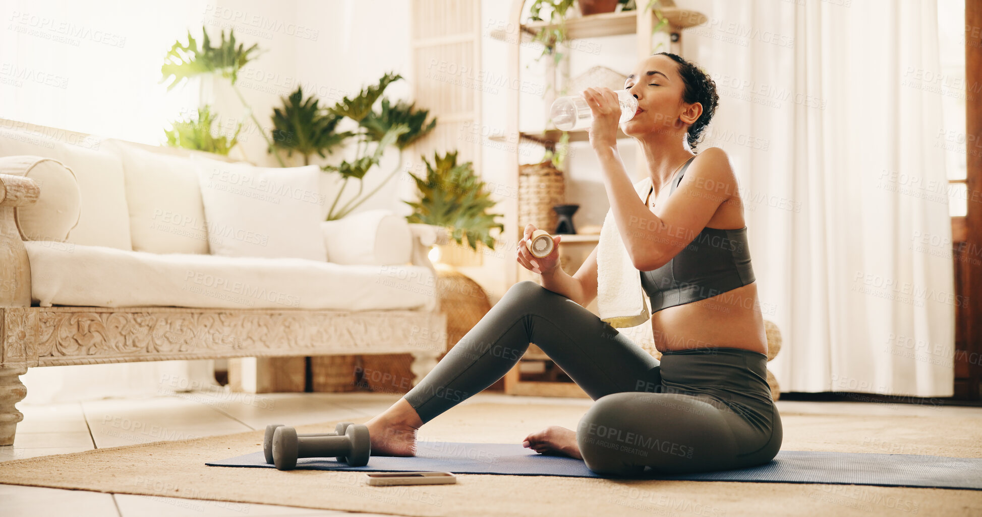 Buy stock photo Break, drinking water and yoga with woman in living room of home for holistic wellness or hydration. Bottle, drink and exercise with yogi person on floor in apartment for health activity or recovery