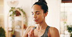 Home, yoga and woman in lounge, hands together or meditation for breathing exercise. Apartment, yogi or person in living room, stress relief or fitness for balance, zen or chakra for holistic healing