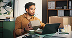 Laptop, box and businessman in office with logistics research for online delivery information. Computer, typing and male supply chain manager with email for shipping communication in workplace.