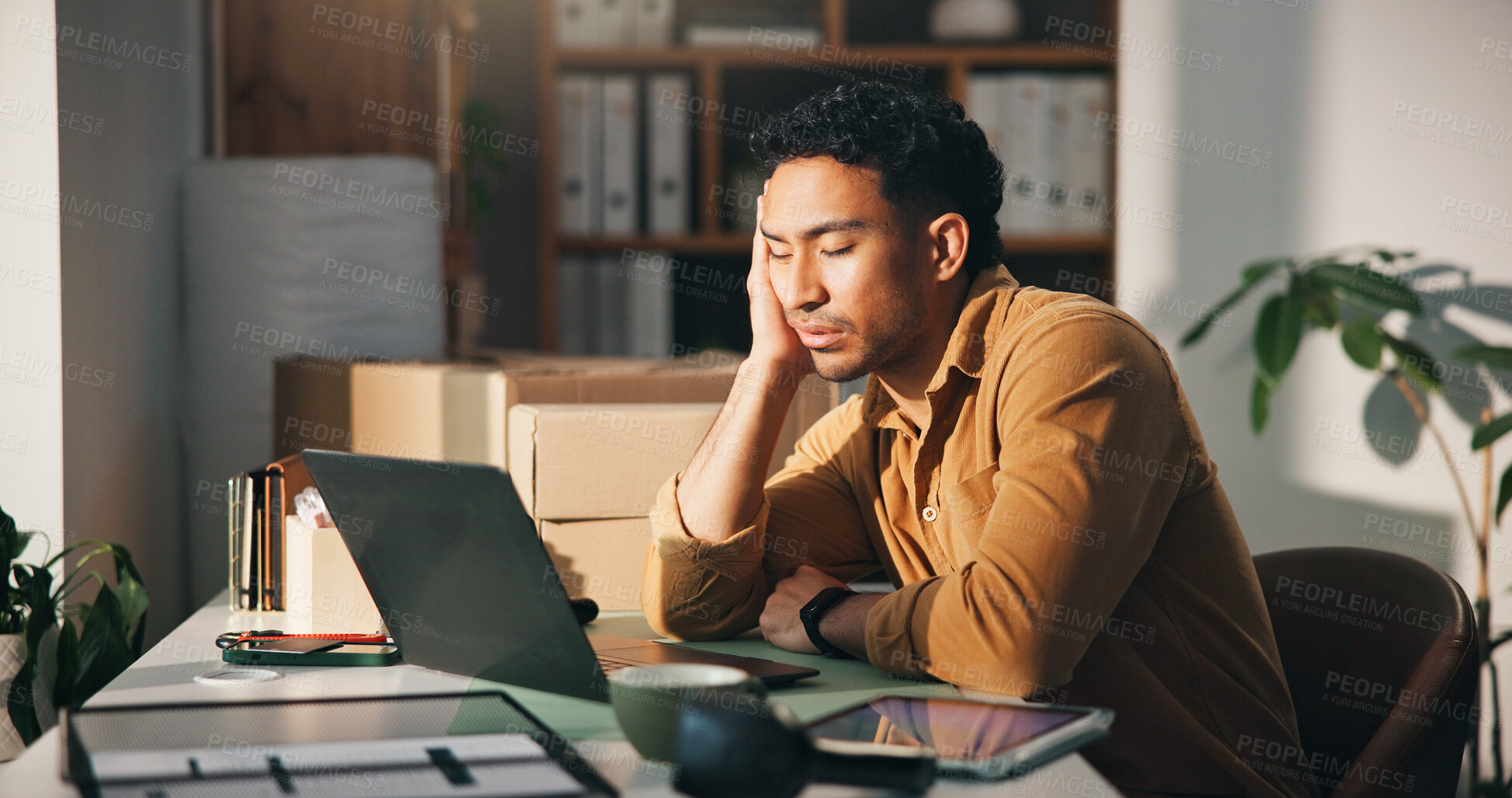 Buy stock photo Burnout, laptop and logistics with man in office for delivery, distribution or shipping of boxes. Computer, fatigue and supply chain with tired employee at desk in workplace for courier service
