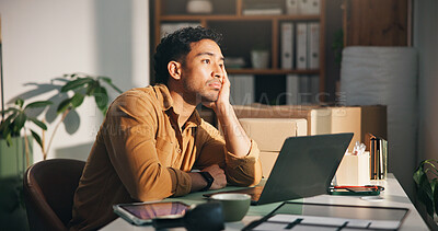 Buy stock photo Laptop, logistics and thinking with man in office for delivery, distribution or shipping of boxes. Bored, computer and supply chain with ecommerce employee at desk in workplace for courier service