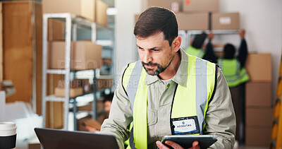 Buy stock photo Logistics, man and tablet in depot with laptop, shipping email or courier app to track package. Supply chain, person and reading in warehouse with tech, dispatch and delivery update for online order.