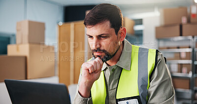 Buy stock photo Logistics, man and reading in depot with laptop, problem solving and thinking for shipping update. Supply chain, person and contemplation in workplace with computer, courier website and online order.