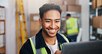Logistics, man and smile in warehouse with laptop, shipping update or good news for package delivery. Supply chain, person and happy in depot with computer, check email or review for courier service.
