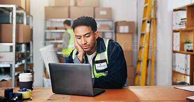 Buy stock photo Shipping, reading and bored man with laptop in warehouse for supply chain, logistics or procurement. Computer, distribution and tired entrepreneur in office, ecommerce email and lazy with burnout