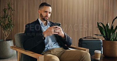 Buy stock photo Investor, luggage and man in airport, cellphone for online flight schedule and social media. Person, trader and professional on chair, smartphone and email for visa application, app or communication