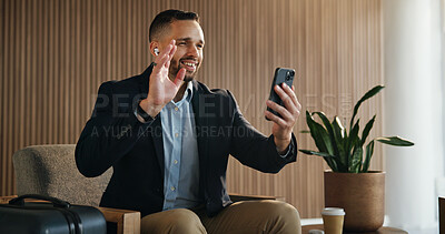 Buy stock photo Video call, phone and wave with man in airport lounge for chat, layover update and contact. Communication, luggage and travel with person and mobile in vip lobby for connection and business class