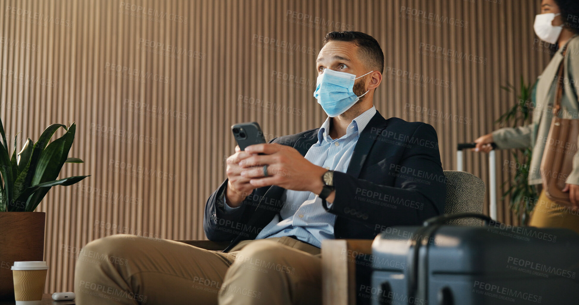 Buy stock photo Financial advisor, thinking and man in airport, cellphone for online flight schedule and social media. Person, face mask and investor on chair, smartphone and email for visa application or decision