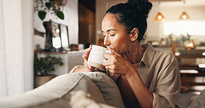 Buy stock photo Aroma, coffee and relax with woman on sofa in living room of home for break, chilling or me time. Drink, scent and wellness with calm person in apartment on weekend for beverage, rest or unwind