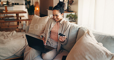 Buy stock photo Laptop, payment and woman on couch with credit card, utility bills and savings for eft transaction. Person, smile and computer in home with digital banking, household expenses and rebate for taxes.