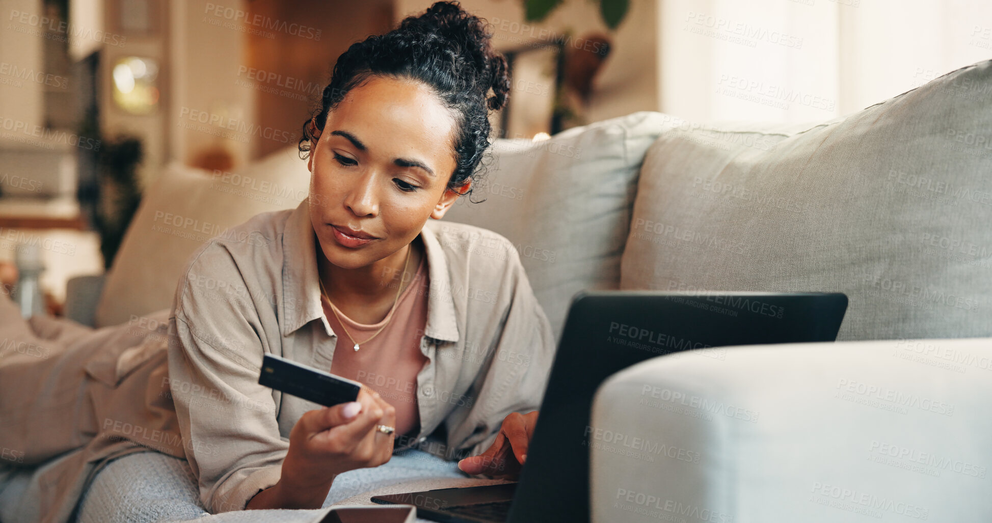 Buy stock photo Laptop, payment and woman in living room with credit card, check account number or online shopping order. Person, relax and digital banking in home with computer, fintech or browse ecommerce website.