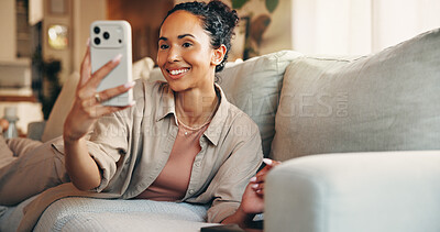 Buy stock photo Smile, selfie and woman on sofa in home for profile picture, social media post and influencer. Living room, relax and female person with photo for happy memory, update or content creation in house