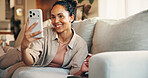 Smile, selfie and woman on couch in home for profile picture, social media post and influencer. Living room, relax and female person with photo for happy memory, update or content creation in house