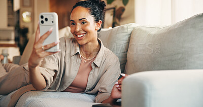 Buy stock photo Smile, selfie and woman on couch in home for profile picture, social media post and influencer. Living room, relax and female person with photo for happy memory, update or content creation in house