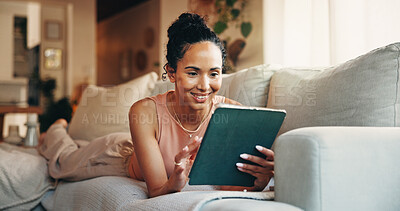 Buy stock photo Woman, relax and reading in home with tablet, text message notification and website for online news. Female person, smile and browsing on sofa with tech, social media or digital app for blog article.