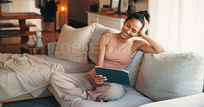 Buy stock photo Happy, woman and relax on couch with tablet, watch social media video and entertainment on weekend. Female person, smile or peace in home with tech, digital app or streaming website for online movie.