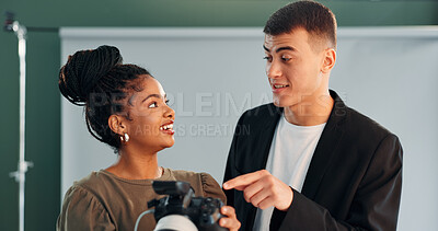 Buy stock photo Smile, people and photographer with camera in studio for photoshoot results, catalog or selection. Woman, talking and backstage with model, review picture and film production of photography industry