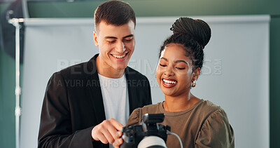 Buy stock photo Discussion, photographer and model with camera in studio, review image and tips for expression check. Photography, tech or happy people with conversation for picture selection, pose idea and creative
