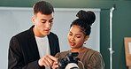Conversation, photographer and model with camera in studio, review image and tips for expression check. Photography, tech or people with discussion for picture selection, production idea or creative