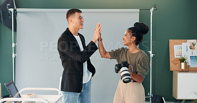 Buy stock photo Happy, photographer and model in studio with high five, camera and teamwork for production success. People, smile and celebration with photoshoot achievement, photography and creative collaboration.