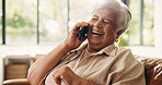 Funny, phone call and senior woman in home for joke, comedy or gossip story to relax in retirement. Mobile, living room and elderly person laugh for humor, talking and communication with contact