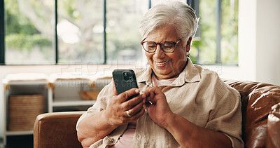Buy stock photo Funny, phone and scrolling with old woman on sofa in home for retirement or social media. App, laughing and relax with happy senior person in living room of apartment for browsing or communication
