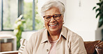 Smile, senior woman and relax at house with peace, calm morning and comfortable on sofa. Portrait, elderly person and laugh on couch, positive attitude and weekend break for retirement in living room