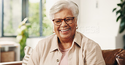 Buy stock photo Smile, senior woman and relax at house with peace, calm morning and comfortable on sofa. Portrait, elderly person and laugh on couch, positive attitude and weekend break for retirement in living room