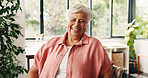 Portrait, senior woman and smile at house with peace, calm morning and comfortable on sofa. Elderly person, relax and laugh on couch, positive attitude and weekend break for retirement in living room