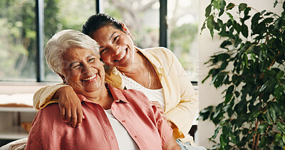 Buy stock photo Hug, senior mom and woman in home with smile, love or bonding together with portrait. Living room, elderly mama and adult daughter with happy family, care or connection with embrace on mothers day