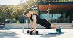 Athlete, man and outdoor with dumbbells for workout, muscle development and health. Sunglasses, fitness and bodybuilder person with weights for exercise by home for push up, challenge and training