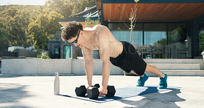 Buy stock photo Athlete, man and outdoor with dumbbells for fitness, muscle development and health. Sunglasses, workout and bodybuilder person with weights for exercise by home for push up, challenge and training