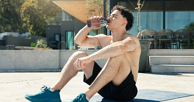 Buy stock photo Outdoor, athlete and man with water, home and body recovery after exercise routine, rest and fitness. Drinking, liquid and person with bottle for hydration, thirsty and wellness with detox on break