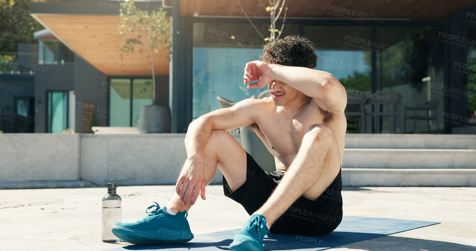 Buy stock photo Fitness, tired or man on porch with mat, cardio rest or break in intense practice. Exercise, exhausted or male person at home with fatigue, ambition and workout recovery in performance goal.