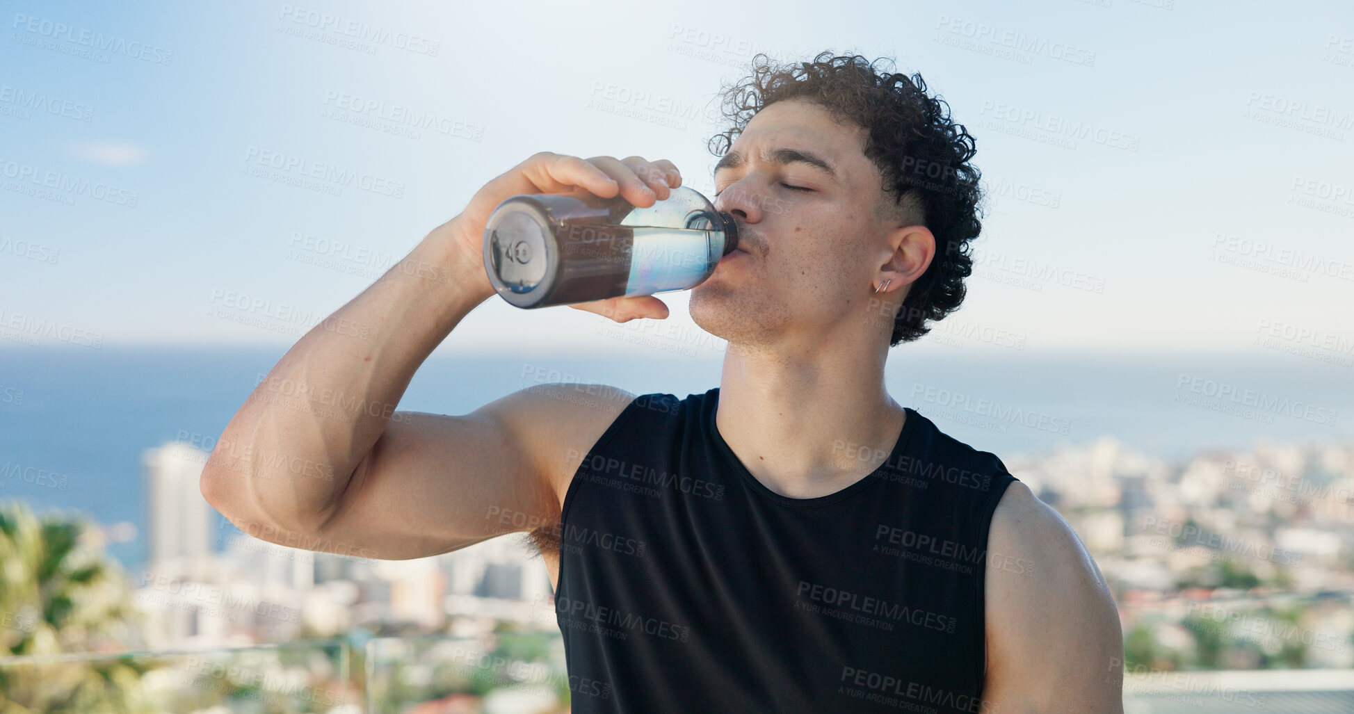 Buy stock photo Outdoor, athlete and man with water, rest and body recovery after workout routine, health or fitness. Drinking, liquid and person with bottle for hydration, thirsty and wellness with drink on break