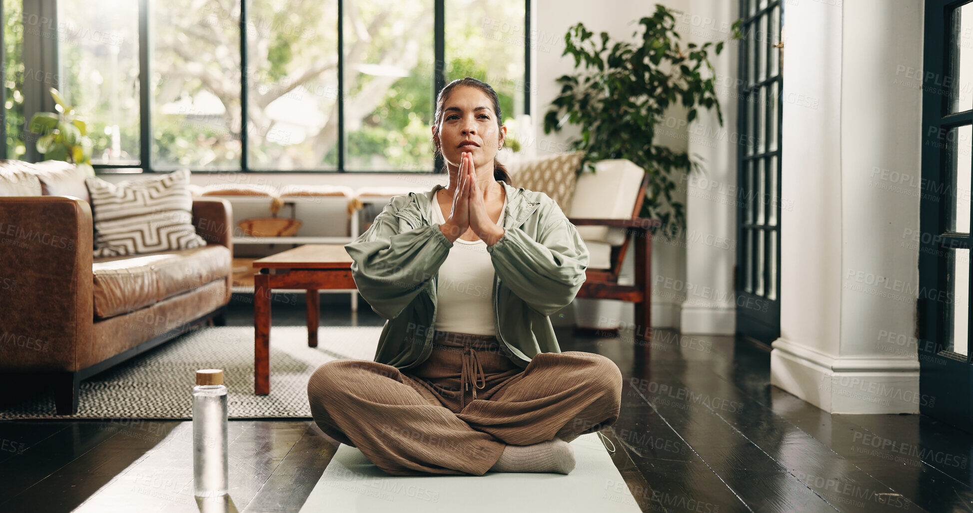 Buy stock photo Yoga, prayer hands or woman in house with meditation, calm practice or mindfulness in wellness activity. Inner peace, mature or person with lotus, zen or mindset improvement for holistic health.