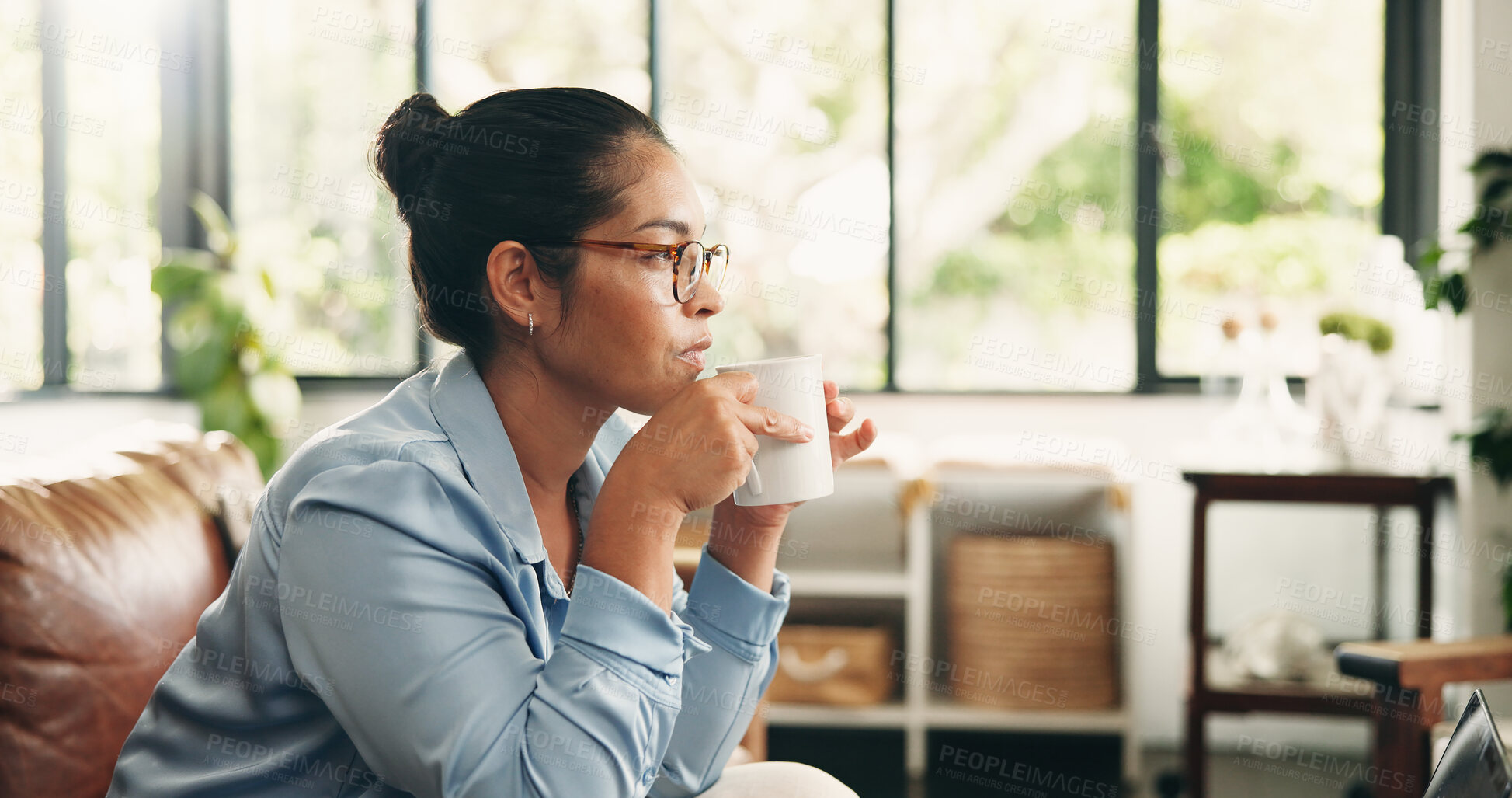 Buy stock photo Serious, woman and thinking with coffee on sofa to start morning, inspiration and self reflection. Home, calm person and thoughtful with hot beverage in living room for planning day and contemplating