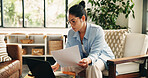 Woman, laptop and finance with documents in home for budget planning, report or expenses. Female person, accounting or checking with paperwork on computer for financial audit or investment in house
