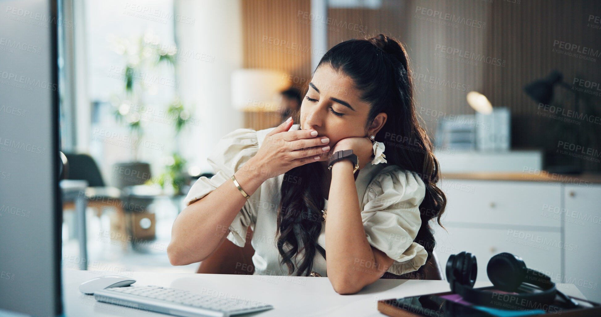 Buy stock photo Yawning, employee and woman with computer, office or journalist with article, creative and exhausted. Newsroom, burnout and person with low energy for story submission, online and sleepy on table