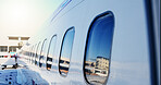 Airplane, windows and outdoor at airport for travel with flying, transportation services or global journey. Plane, glass and commercial airline for international trip, flight or boarding on runway