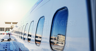 Buy stock photo Airplane, windows and outdoor at airport for travel with flying, transportation services or global journey. Plane, glass and commercial airline for international trip, flight or boarding on runway