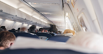Buy stock photo Airplane, cabin and people in row for travel with flying, transportation services or global journey. Plane, group and passenger on international trip, back or relax with airline on flight for tourism