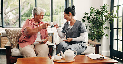 Buy stock photo Nurse, old woman and cheers with tea in nursing home, smile and bonding with funny joke. Coffee, caregiver and toast with elderly person for medical wellness, support or laugh in house for healthcare