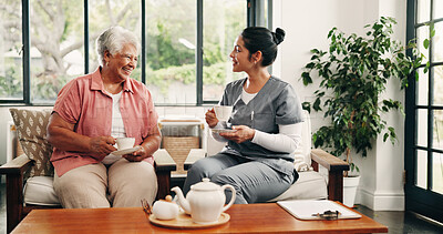 Buy stock photo Happy, caregiver and drinking tea in nursing home with old woman, visit and support for bonding together. People smile, senior person and nurse in retirement center with beverage, trust and kindness.