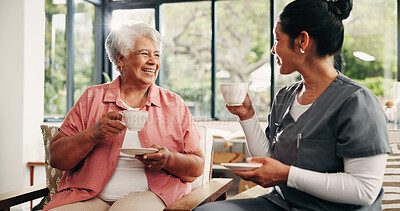 Buy stock photo Caregiver, conversation and drinking tea in nursing home with old woman, visit and bonding together. Flare, senior person smile and nurse in retirement center with warm beverage, kindness and chat.