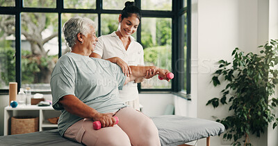 Buy stock photo Physical therapy, dumbbells or senior woman in clinic, medical recovery evaluation or arm exercise. Smile, specialist or old person with injury assessment for healing progress, weights or assistance