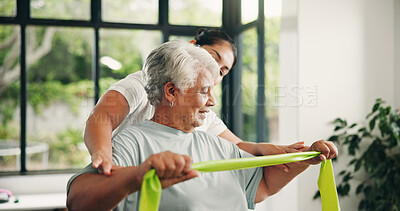 Buy stock photo Woman, physiotherapy and senior with resistance band for arm exercise or muscle recovery in clinic. Female person, physio or helping elderly patient with physiotherapist, support and health center 