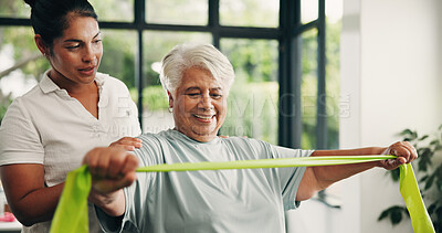 Buy stock photo Woman, physiotherapist and elderly with resistance band for arm exercise or muscle recovery in clinic. Female person, physio or helping senior patient with physiotherapy, support and health center